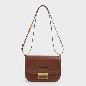 Charles & Keith Brown Crossbody Bag with Gold Accents